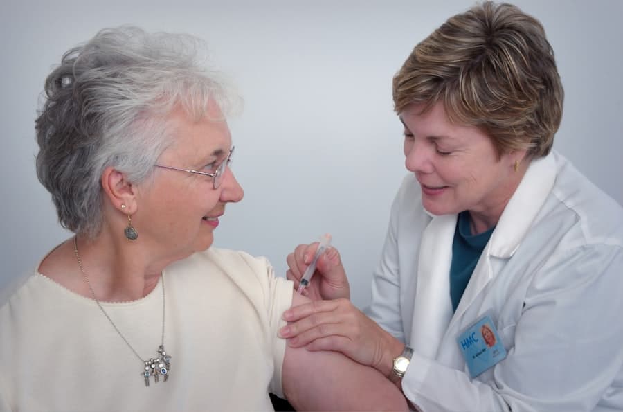 Nurse caring for an older patient
